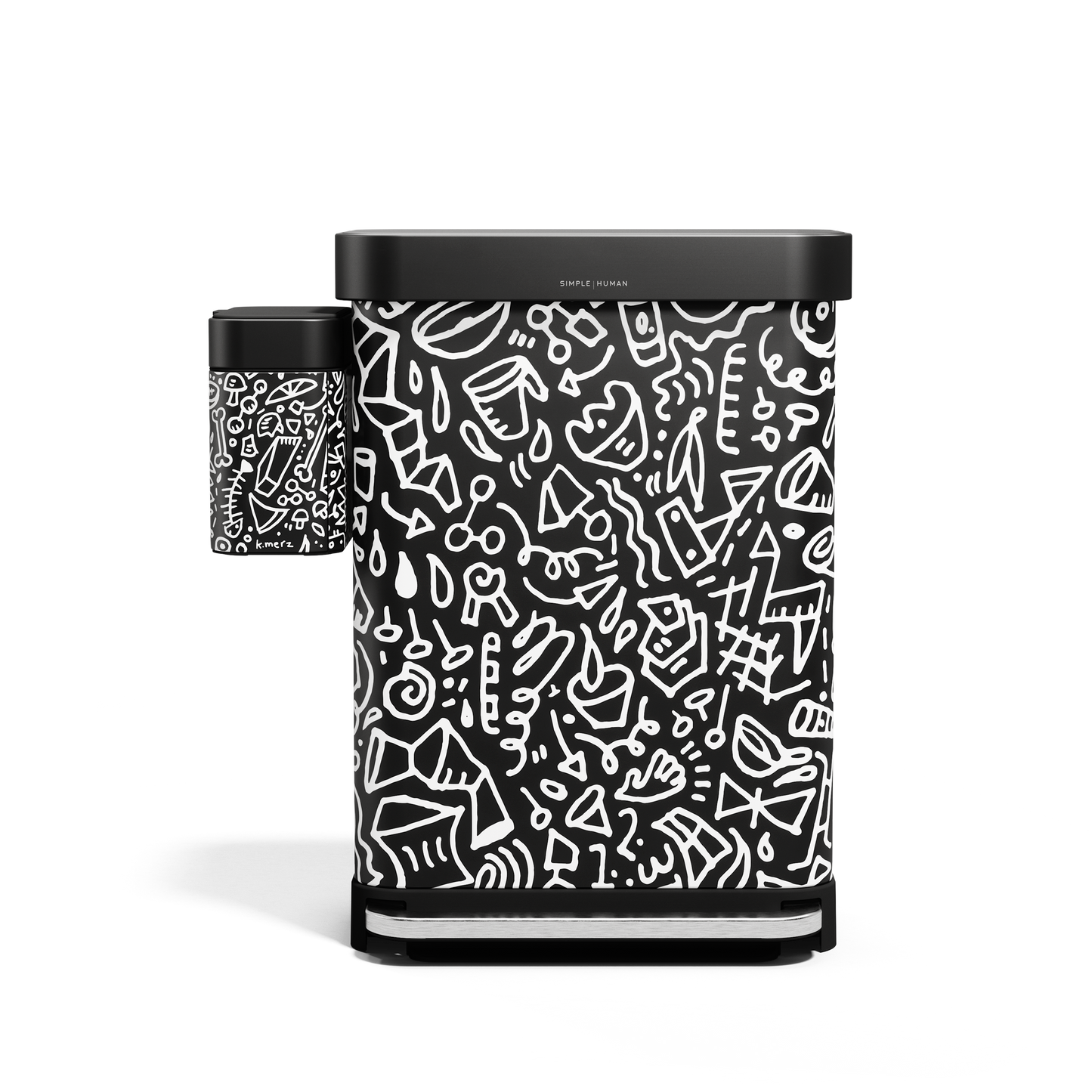 Simplehuman Compost Caddy shown next to matching Step Can in Matte Black with white doodle pattern, for complete waste system.