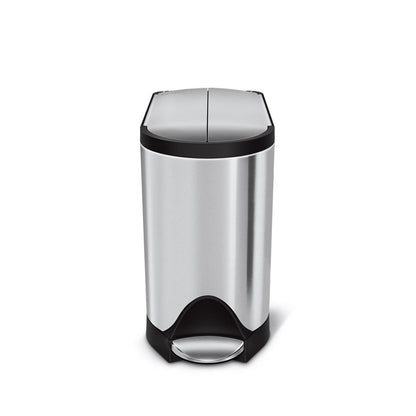 Angled view of Simplehuman 10L Butterfly Step Can in Brushed Stainless Steel, space-saving split lid, hands-free operation.