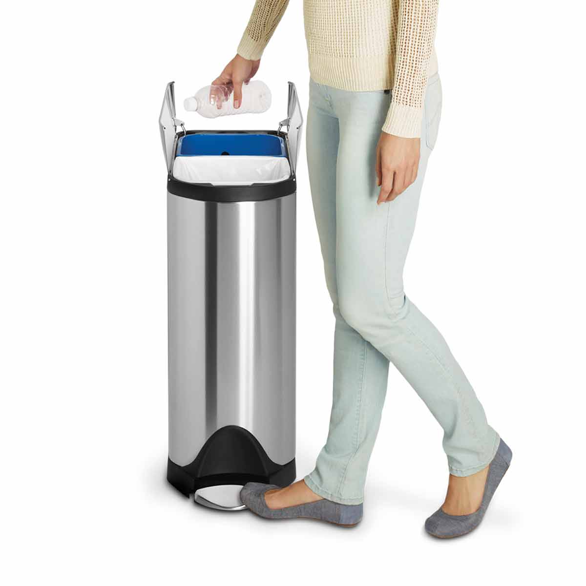 Usage shot of Simplehuman 40L Dual Compartment Butterfly Step Can, Brushed Stainless Steel, using the pedal for hands-free recycling.