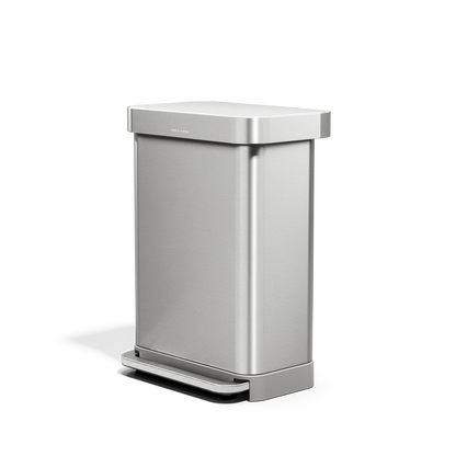 Angled view of Simplehuman 55L Rectangular Step Can in Brushed Stainless Steel, hands-free foot pedal, and liner pocket.