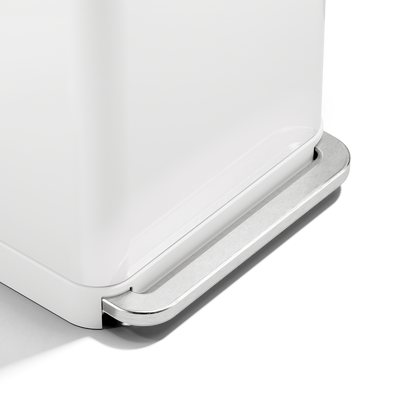 Detail view of Simplehuman 55L Rectangular Step Can in White, showing the durable stainless steel foot pedal for hands-free operation.
