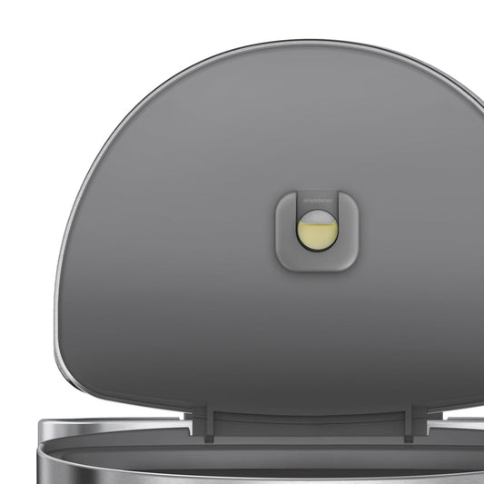 Detail view of Simplehuman 45L Semi-Round Step Can lid interior, showing replaceable odor control pod.
