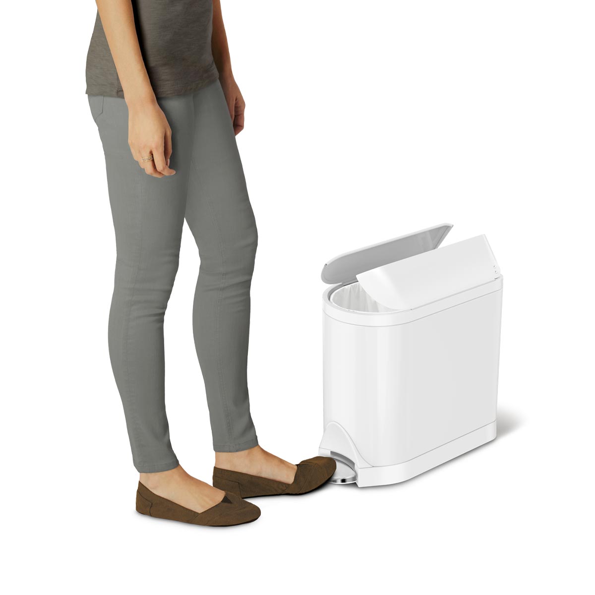 Simplehuman White 10L Butterfly Step Can, person activating hands-free foot pedal to open split lid.