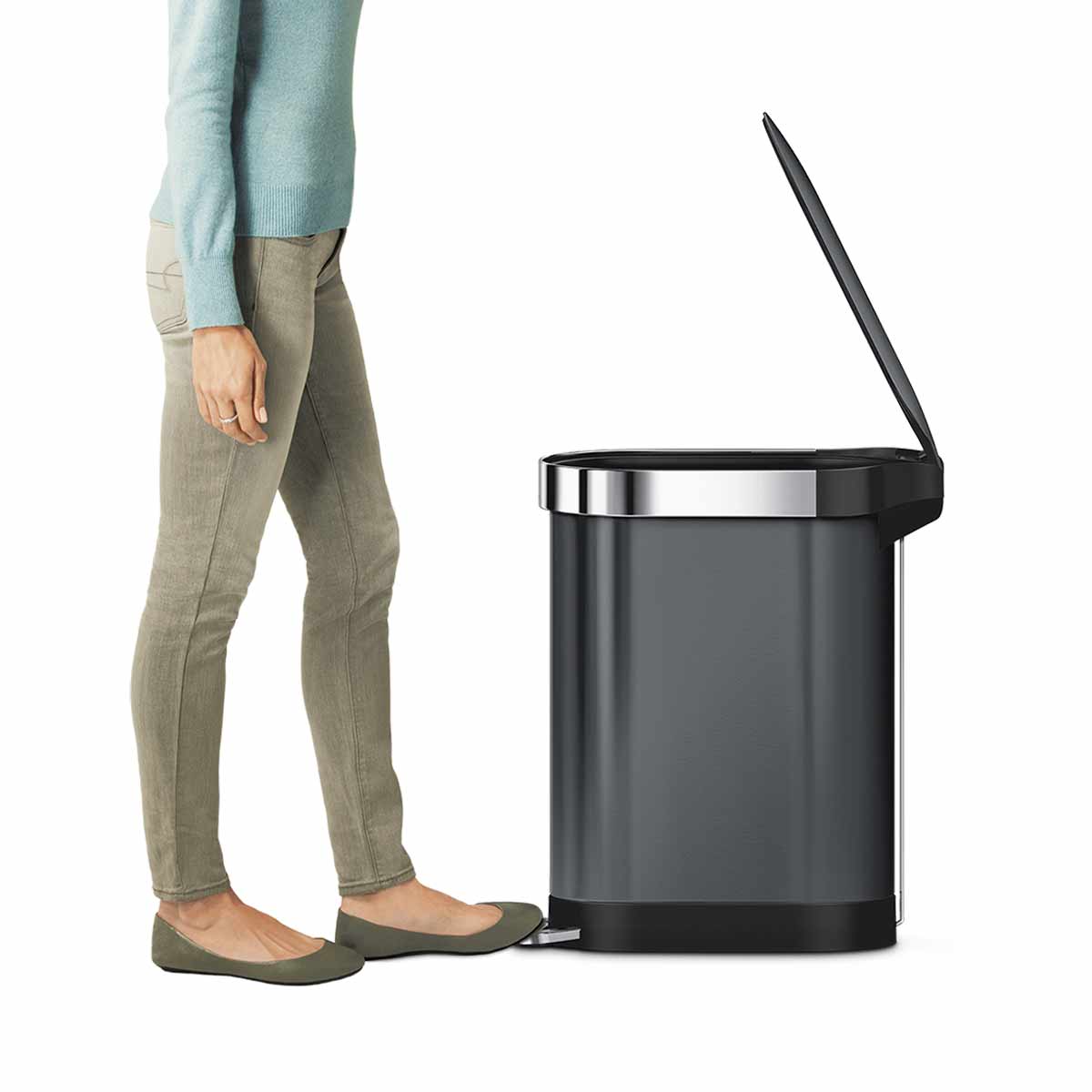 Side view of Simplehuman 45L Slim Step Can in Dark Bronze, showing hands-free foot pedal opening the lid.