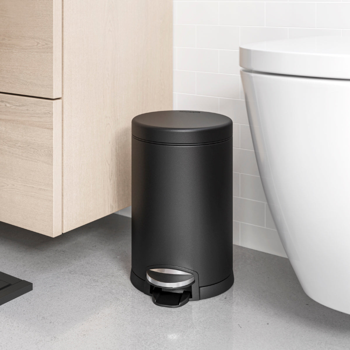 Simplehuman 4.5L Round Step Can, Matte Black, compact size for modern bathroom, hands-free pedal.