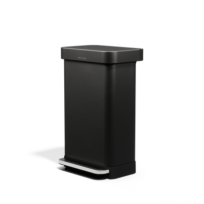Angled view of Simplehuman 45L Matte Black Rectangular Step Can, hands-free pedal, liner pocket.