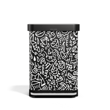 Simplehuman 55L Rectangular Step Can, black with white doodle graphic print, hands-free pedal, and liner pocket.