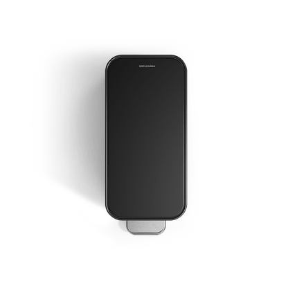 Simplehuman's 9L Slim Step Can in Matte Black top view showcasing the lid and pedal of the can.