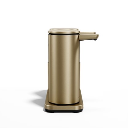 Side profile of Simplehuman Brushed Brass Dual Sensor Pump 14 oz. on caddy, rechargeable, hands-free dispensing.