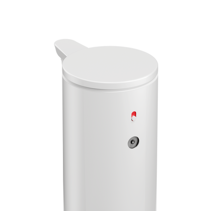 High-angle detail view of Simplehuman 9 oz. Sensor Pump (White), highlighting the dosage control switch.