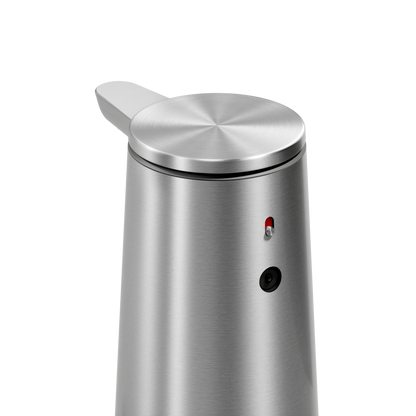 Detail view of Simplehuman Brushed Stainless Steel Sensor Pump Foam showing the sensor eye and indicator light for touch-free use.