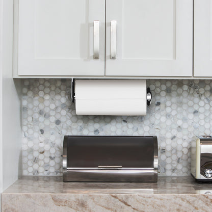Lifestyle shot of Simplehuman Polished Stainless Steel Quick-Load Paper Towel Holder under kitchen cabinets.