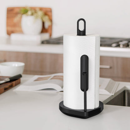 Simplehuman Matte Black Tension Arm Paper Towel Holder on counter, showing easy carry loop handle.