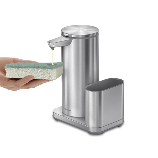 Simplehuman Brushed Stainless Steel Sensor Pump with Caddy dispensing soap onto sponge, touch-free.