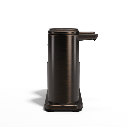 Straight-on isolated view: Simplehuman Dark Bronze Dual Sensor Pump 14 oz. with Caddy, rechargeable, hands-free dispensing.