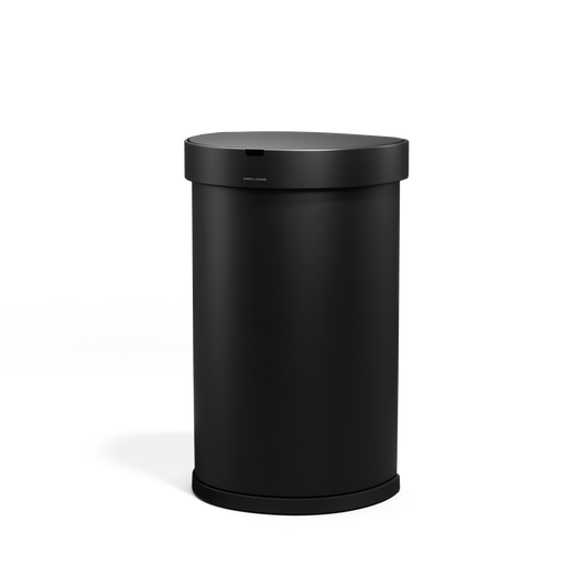 Angled view of Simplehuman 45L Sensor Can, Matte Black, hands-free operation.