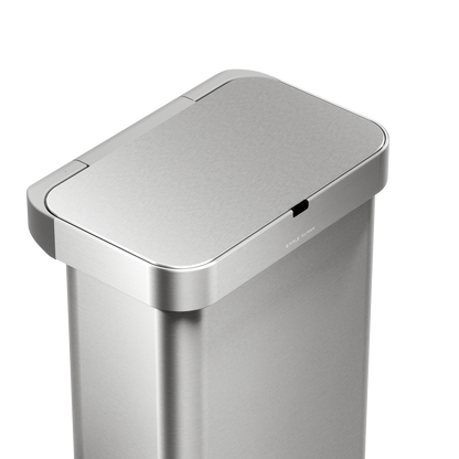 Detail view of Simplehuman 58L Rectangular Sensor Can in Brushed Stainless Steel showing touch-free sensor lid.