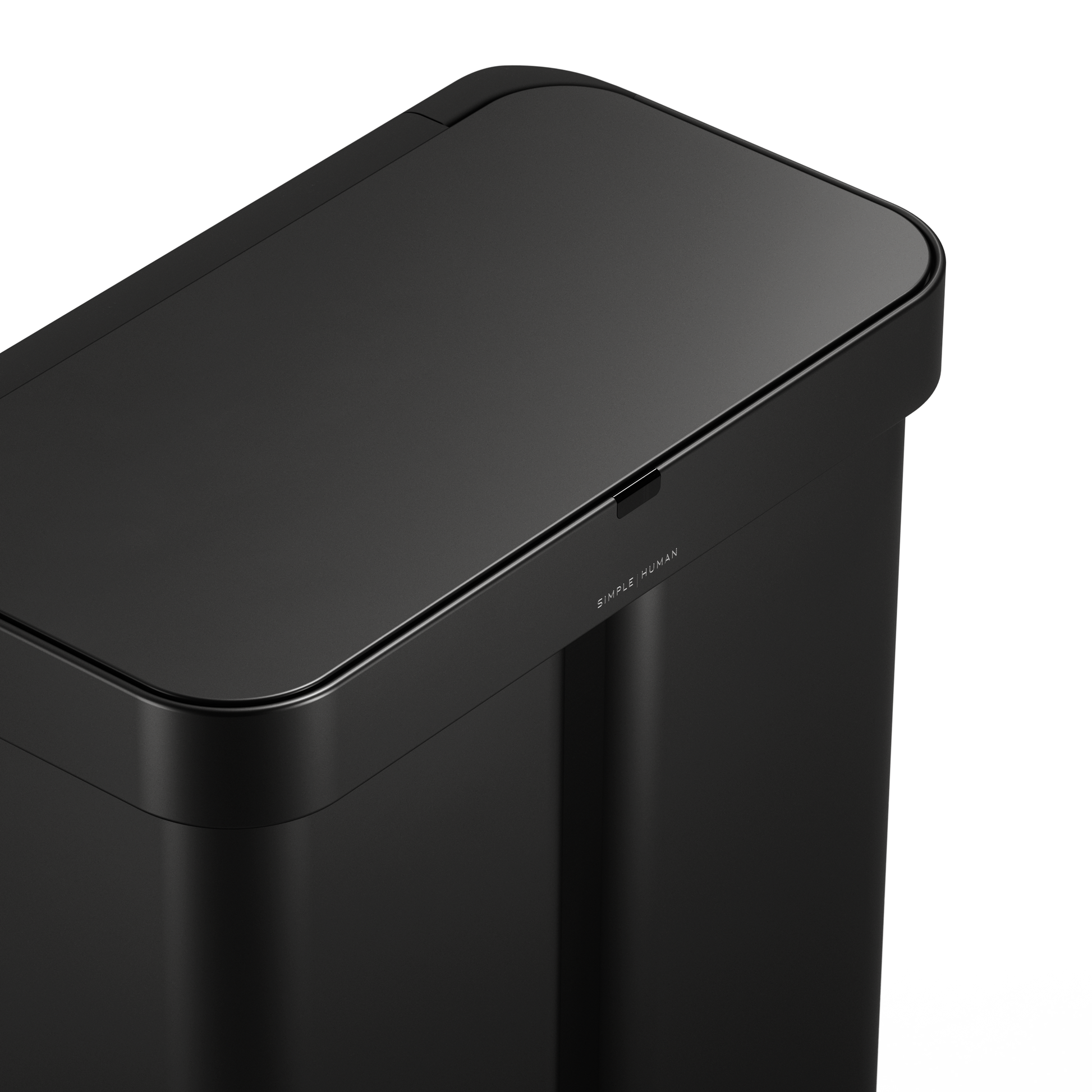 Detail view of Simplehuman Matte Black 58L Sensor Recycler lid, highlighting the logo and touch-free sensor area.