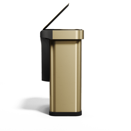 Simplehuman's Sensor Can in Matte Gold Side view showcasing the lid being opened and the black trim around the can.