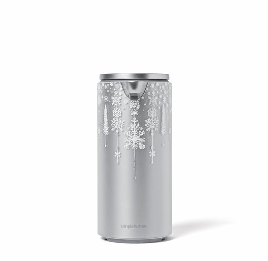 Simplehuman 14 oz. Sensor Pump with Limited Edition Holiday Sleeve, silver finish and white snow pattern, touch-free.