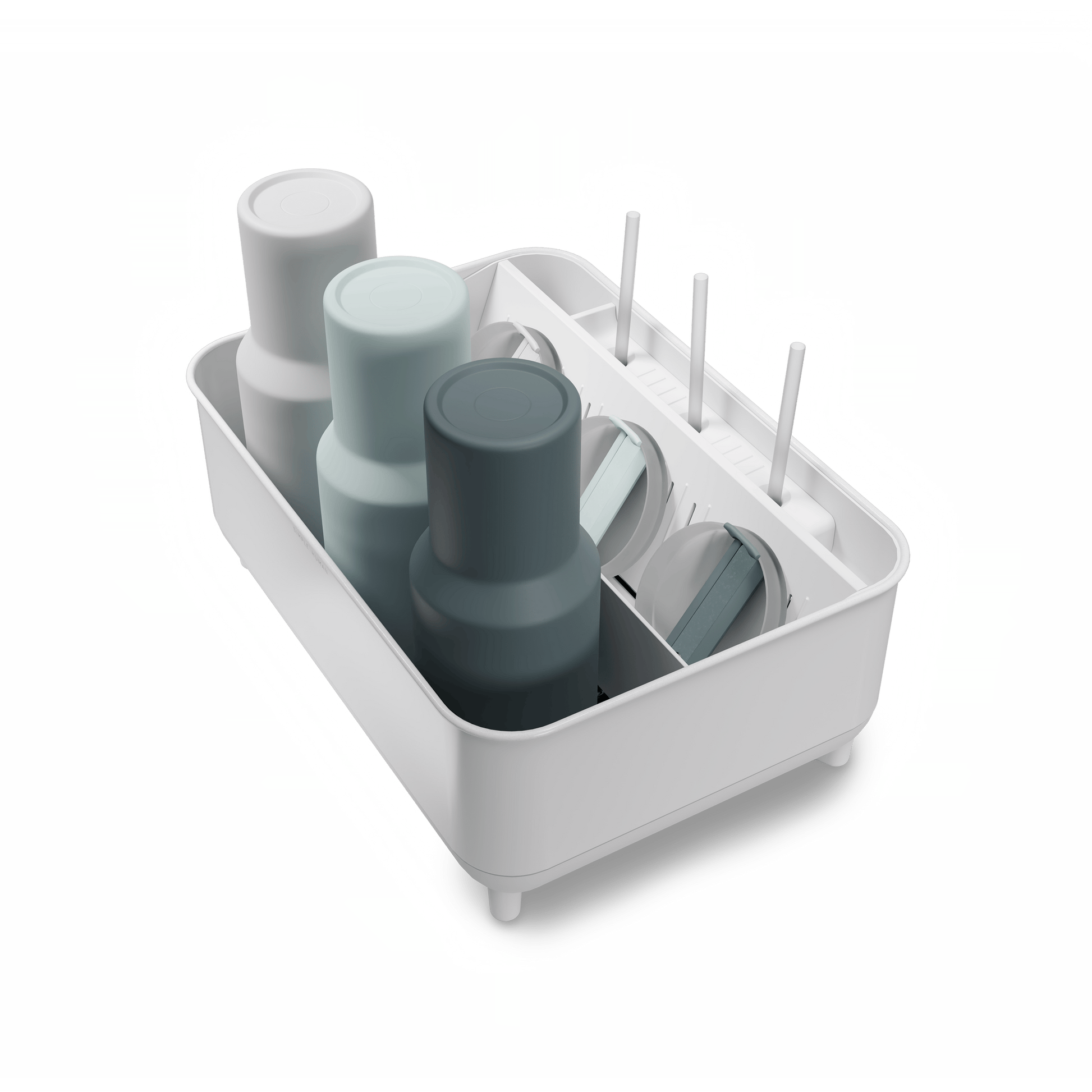 Angled view of Simplehuman White Bottle Dock holding 3 reusable bottles in assorted colors with straws and lids.