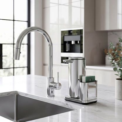 Simplehuman's 14 oz. Liquid Sensor Pump in Polished in a bright kitchen setting with natural light, white countertops and cabinetry, as well as polished sink faucet.