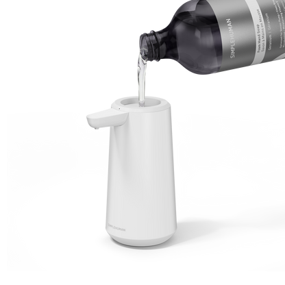 Simplehuman's Refill Bottle filling a Simplehuman Sensor Pump Foam.
