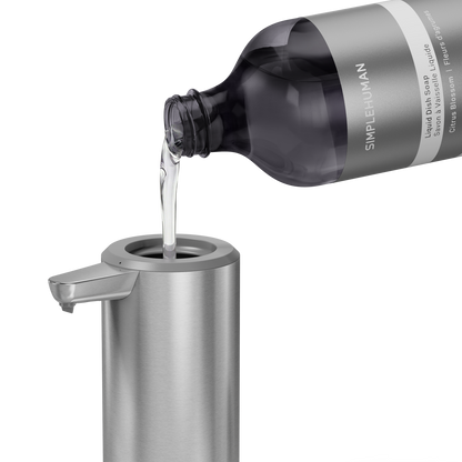 Simplehuman's Refill Bottle filling a Simplehuman Liquid Sensor Pump.