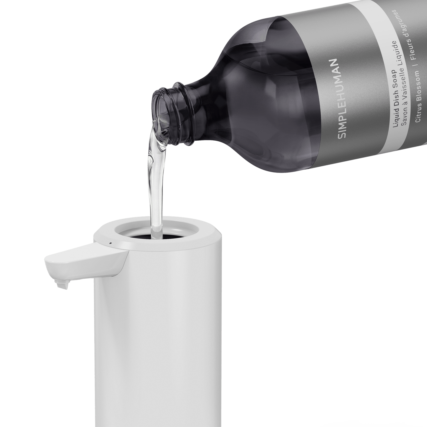 Simplehuman's Refill Bottle filling a Simplehuman Liquid Sensor Pump.