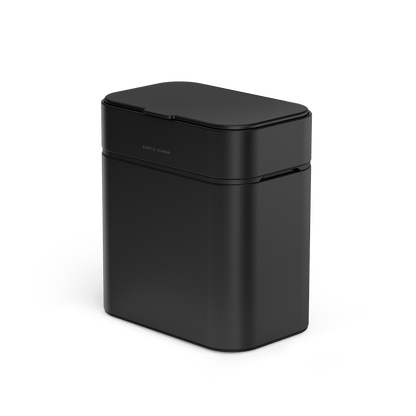 Angled view of Simplehuman Matte Black Shredder, compact and touch-free sensor operation.