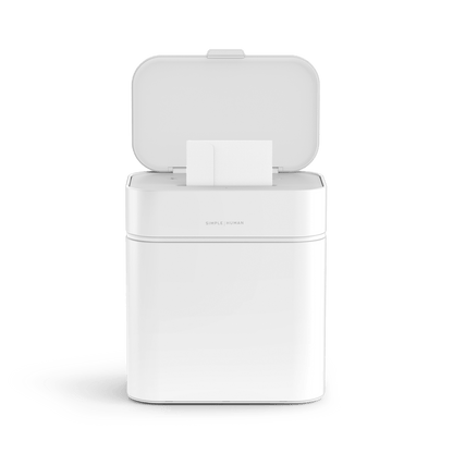 Simplehuman White Shredder, open lid view with document feed slot for touch-free shredding.